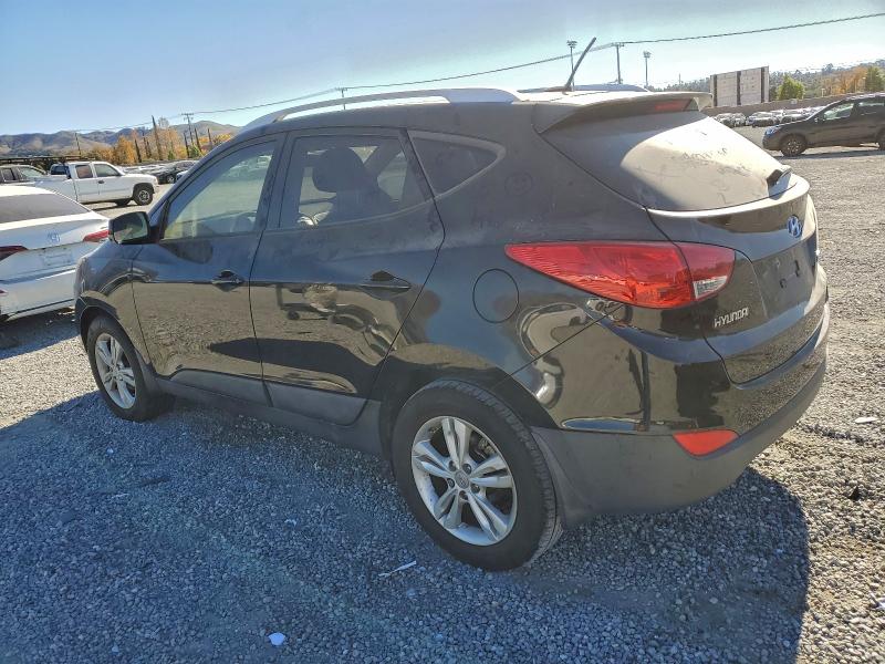 Photo 2 from auction – 2011 HYUNDAI TUCSON GLS with VIN KM8JU3AC8BU300105