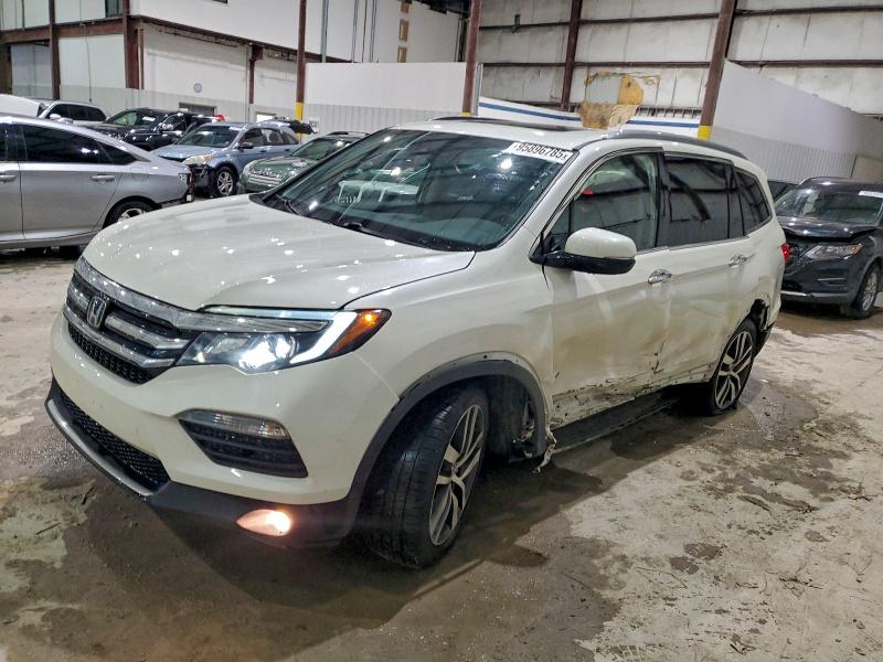 HONDA PILOT ELIT 2017 with VIN 5FNYF6H09HB003341 - Photo from auction