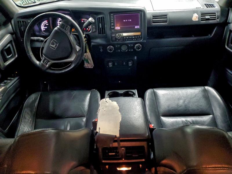 Photo 8 from auction – 2013 HONDA RIDGELINE with VIN 5FPYK1F53DB013684