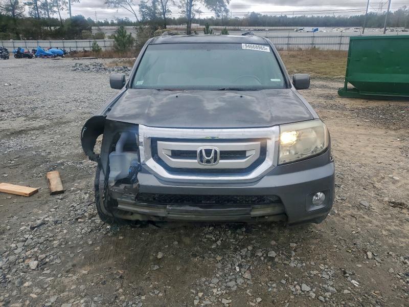 Photo 5 from auction – 2011 HONDA PILOT EXLN with VIN 5FNYF3H75BB008992