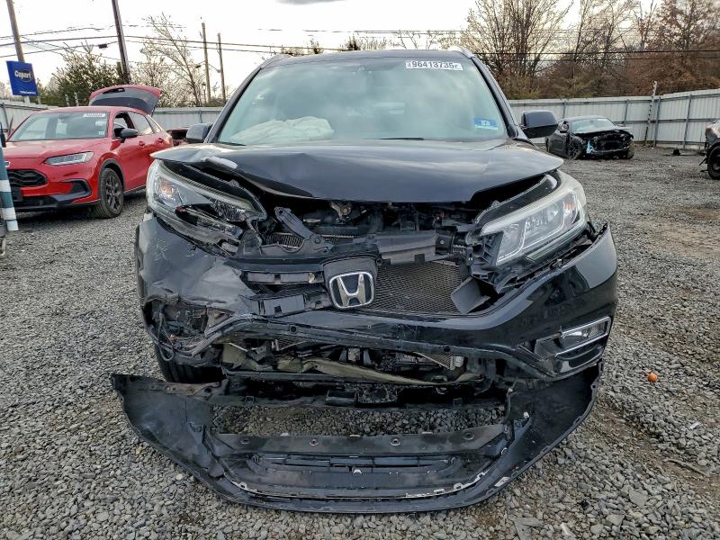 Photo 5 from auction – 2016 HONDA CR-V EXL with VIN 2HKRM4H70GH672805
