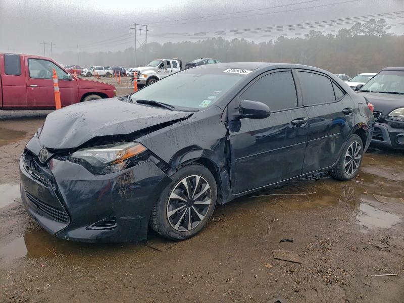 TOYOTA COROLLA L 2017 with VIN 5YFBURHEXHP650103 - Photo from auction