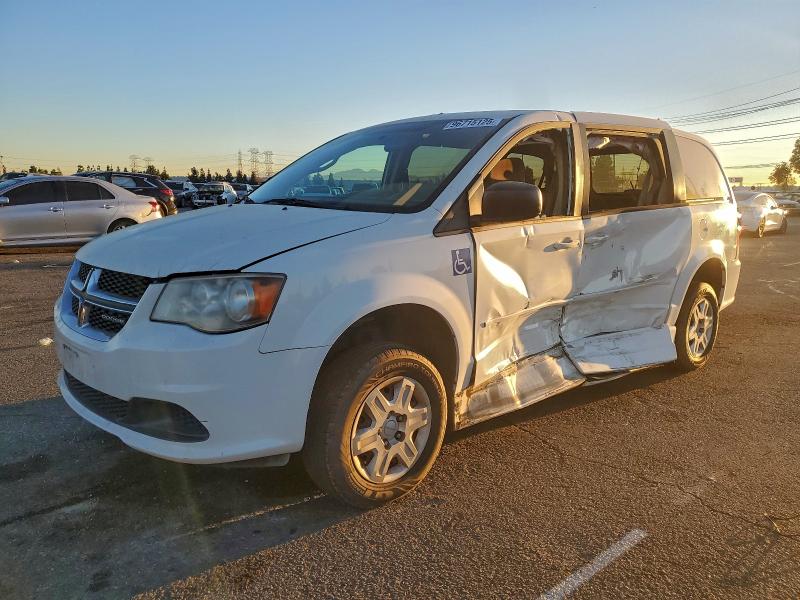 DODGE CARAVAN 2011 with VIN 2D4RN4DG5BR779009 - Photo from auction