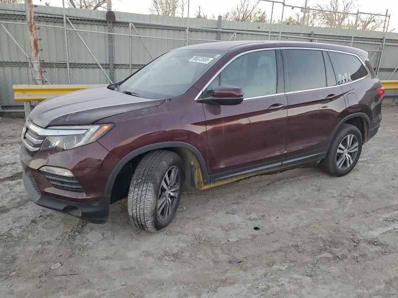 HONDA PILOT EXL 2017 with VIN 5FNYF6H52HB082136 - Photo from auction