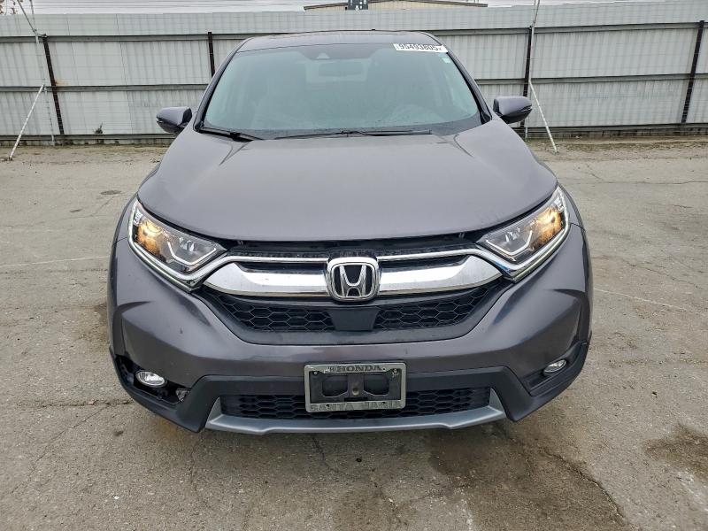 Photo 5 from auction – 2017 HONDA CR-V EXL with VIN 7FARW1H85HE021112