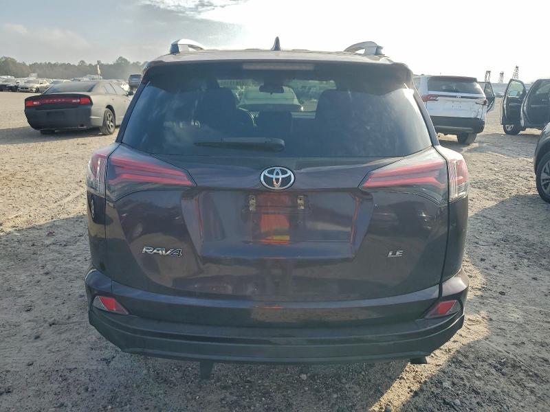 Photo 6 from auction – 2018 TOYOTA RAV4 LE with VIN 2T3ZFREV9JW512478