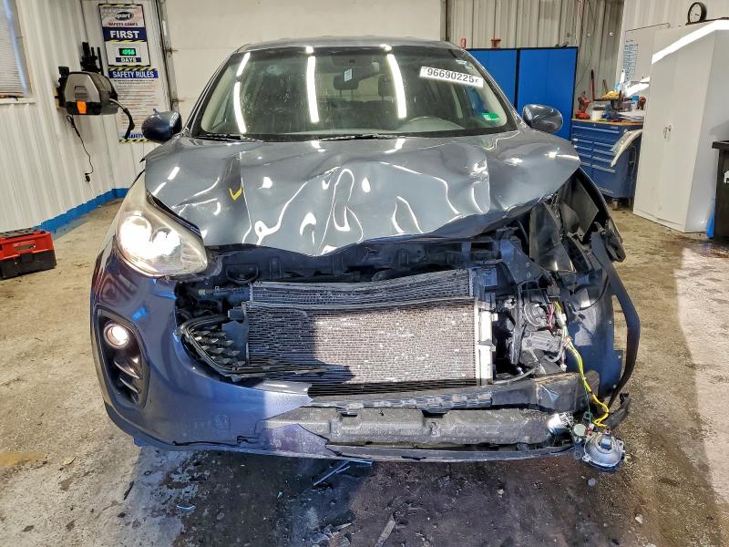 Photo 5 from auction – 2018 KIA SPORTAGE with VIN KNDPMCAC0J7447370