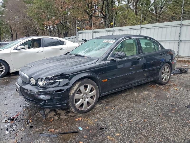 JAGUAR X-TYPE 3.0 2004 with VIN SAJEA51C44WD58167 - Photo from auction