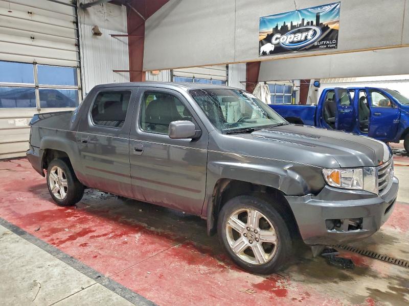 Photo 4 from auction – 2012 HONDA RIDGELINE with VIN 5FPYK1F53CB003042