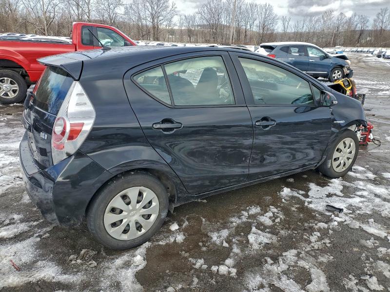 Photo 3 from auction – 2014 TOYOTA PRIUS C with VIN JTDKDTB3XE1565508