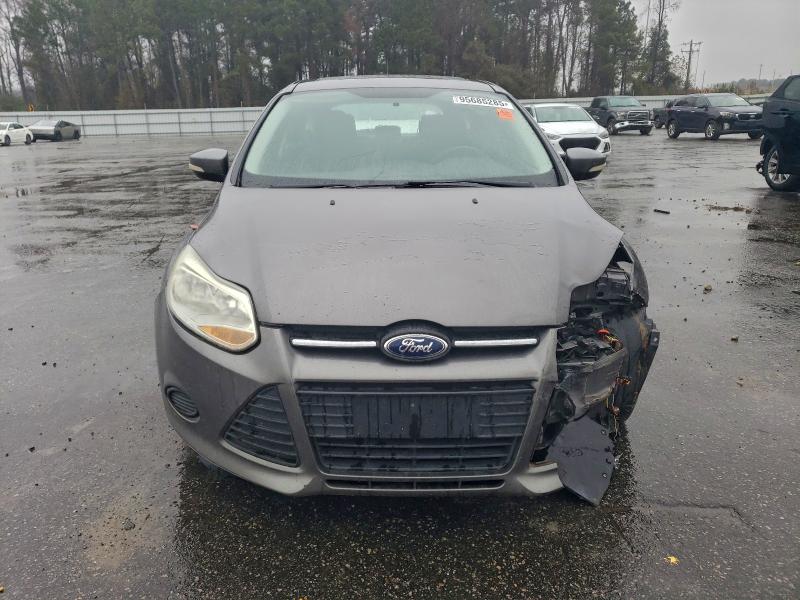 Foto 5 de la subasta – 2014 FORD FOCUS SE con VIN 1FADP3K22EL312863