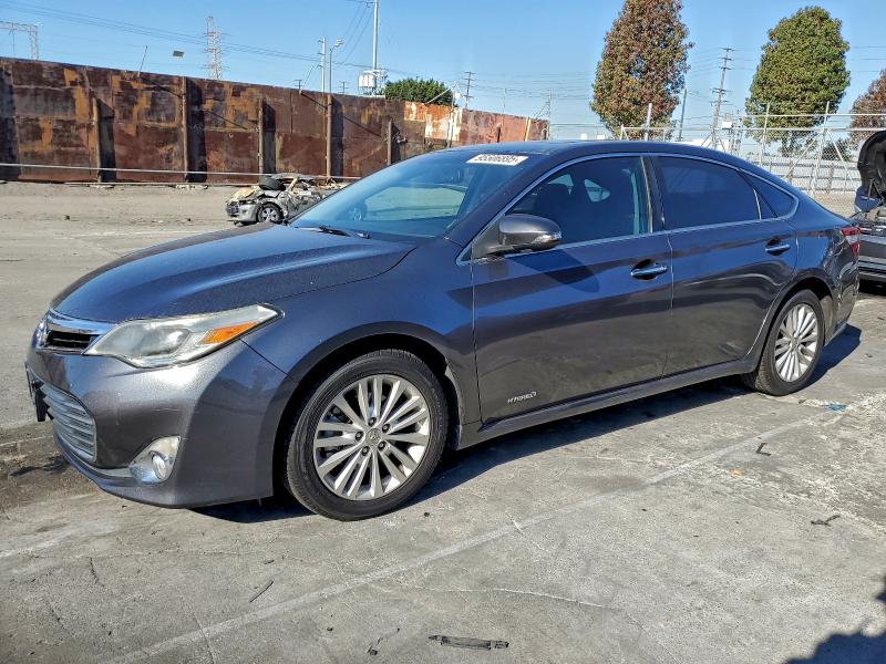 TOYOTA AVALON HYB 2015 with VIN 4T1BD1EB2FU041028 - Photo from auction