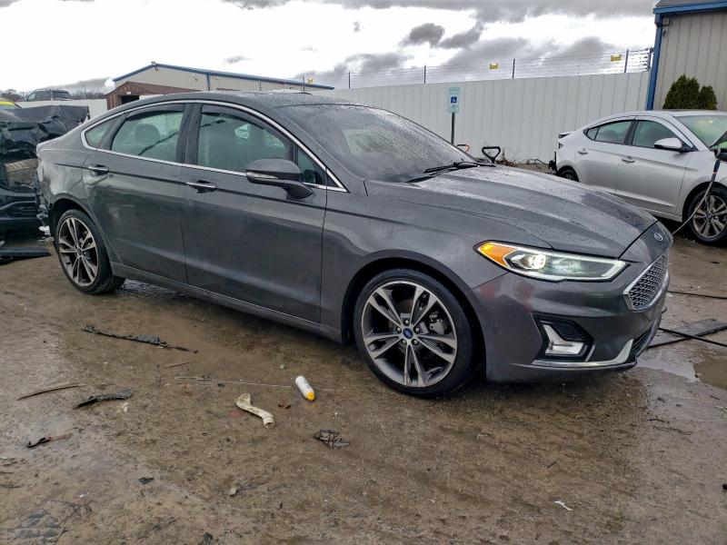 Photo 4 from auction – 2019 FORD FUSION TIT with VIN 3FA6P0D91KR184310