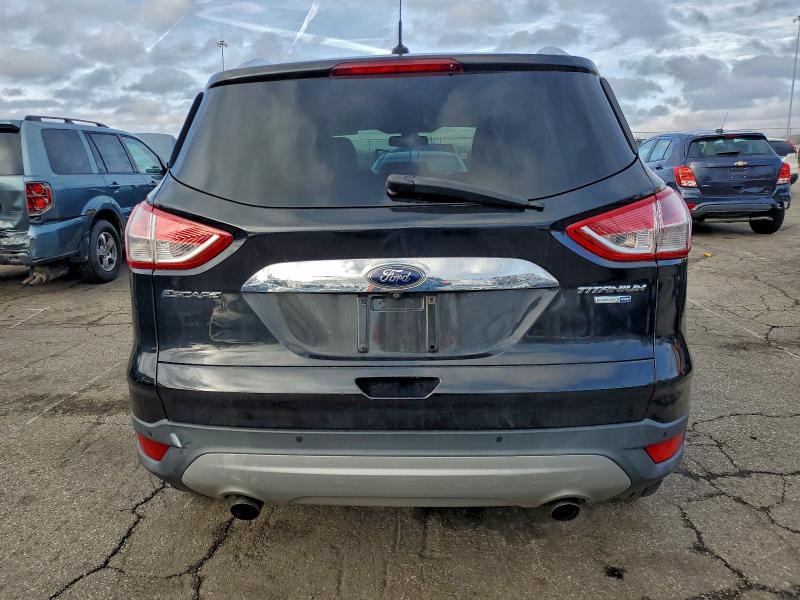 Photo 6 from auction – 2015 FORD ESCAPE TIT with VIN 1FMCU9J98FUB59266