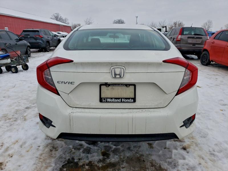 Photo 6 from auction – 2017 HONDA CIVIC LX with VIN 2HGFC2F52HH034773