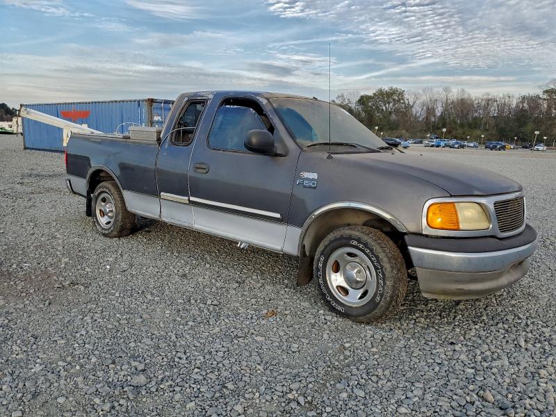 Photo 4 from auction – 2004 FORD F-150 with VIN 2FTRX17294CA84561