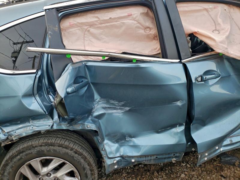 Photo 11 from auction – 2015 HONDA CR-V EXL with VIN 2HKRM4H76FH686500