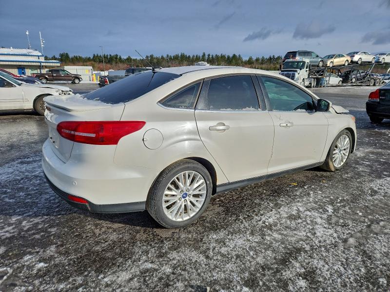 Photo 3 from auction – 2016 FORD FOCUS SEDAN with VIN 1FADP3J22GL247968