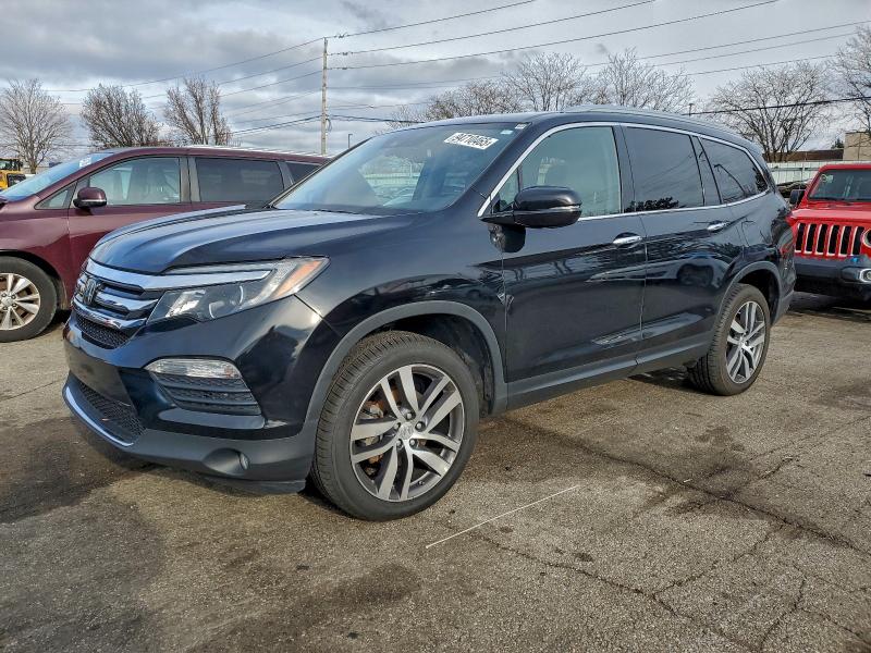 HONDA PILOT ELIT 2017 with VIN 5FNYF6H02HB080830 - Photo from auction