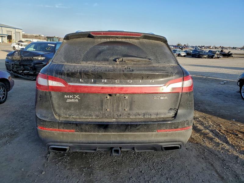Фото 6 с аукциона – 2016 LINCOLN MKX RESERV с VIN 2LMTJ8LP5GBL80950