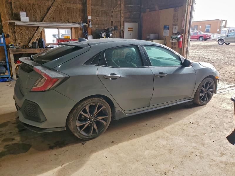 Photo 3 from auction – 2018 HONDA CIVIC with VIN SHHFK7H47JU402376