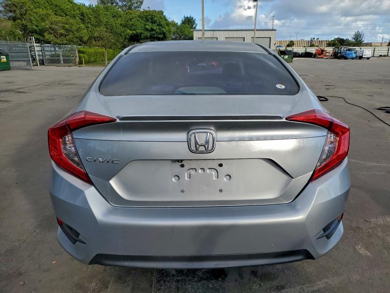Photo 6 from auction – 2017 HONDA CIVIC LX with VIN 19XFC2F50HE063411