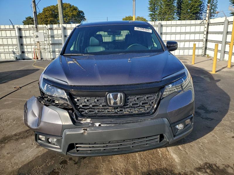 Photo 5 from auction – 2020 HONDA PASSPORT E with VIN 5FNYF7H55LB002925