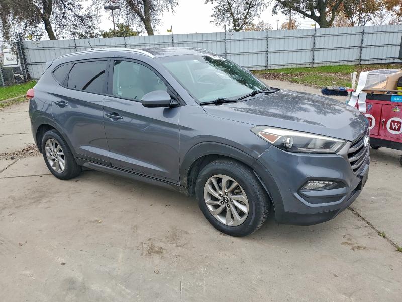 Photo 4 from auction – 2016 HYUNDAI TUCSON LIM with VIN KM8J3CA42GU074629