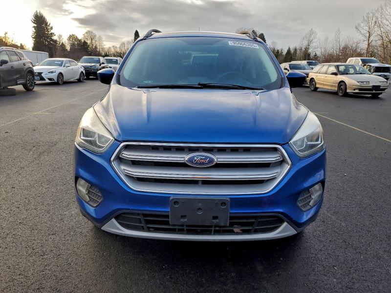 Photo 5 from auction – 2017 FORD ESCAPE SE with VIN 1FMCU9GD1HUC81093