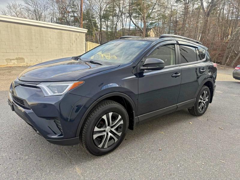 Photo 2 from auction – 2017 TOYOTA RAV4 LE with VIN JTMBFREV1HJ131623