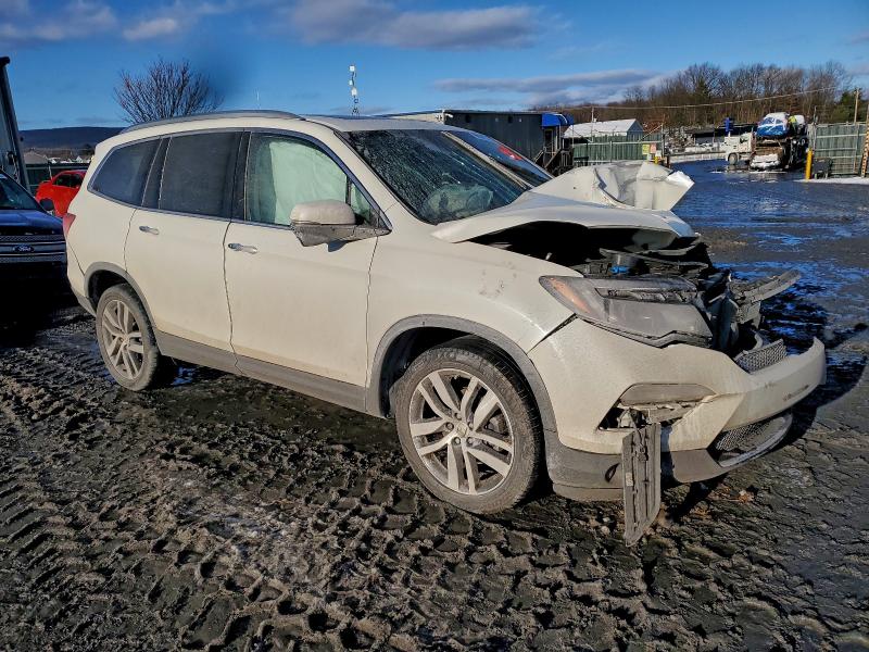 Photo 4 from auction – 2017 HONDA PILOT TOUR with VIN 5FNYF6H94HB064689