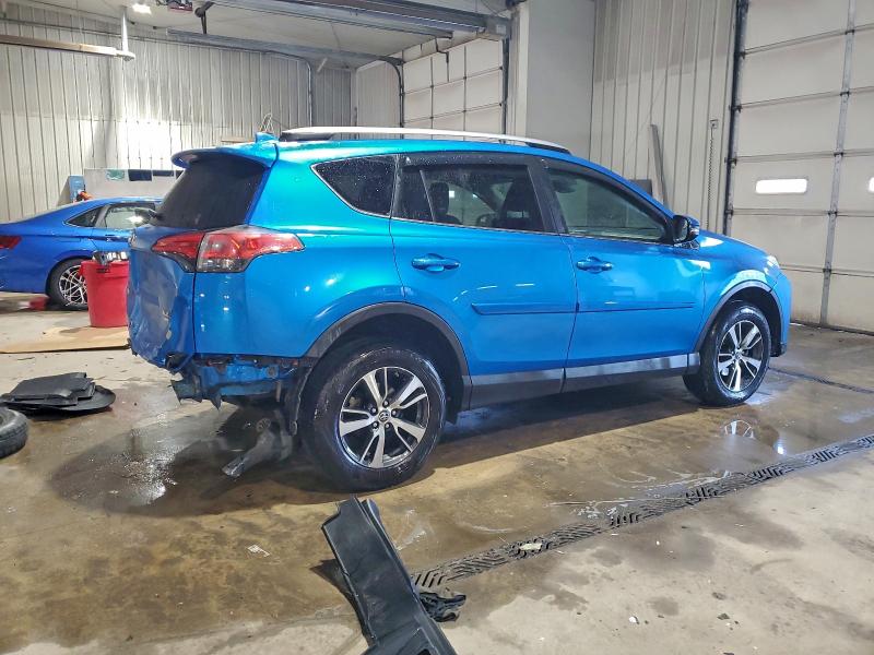Photo 3 from auction – 2017 TOYOTA RAV4 XLE with VIN 2T3RFREVXHW612714