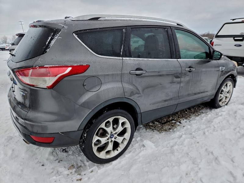 Photo 3 from auction – 2014 FORD ESCAPE TIT with VIN 1FMCU9J99EUA09858