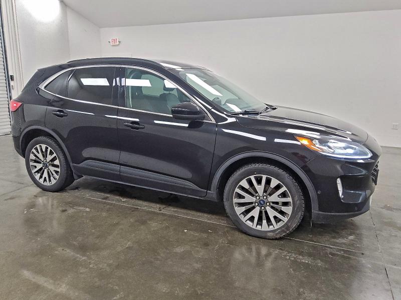 Photo 4 from auction – 2021 FORD ESCAPE TIT with VIN 1FMCU9DZ6MUA80834