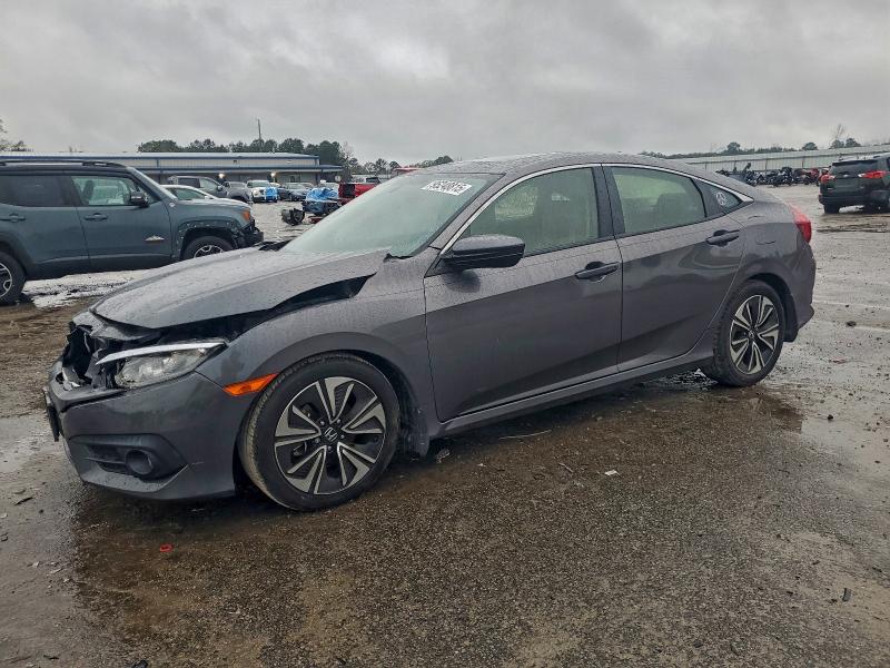 HONDA CIVIC EX 2018 with VIN JHMFC1F31JX003487 - Photo from auction