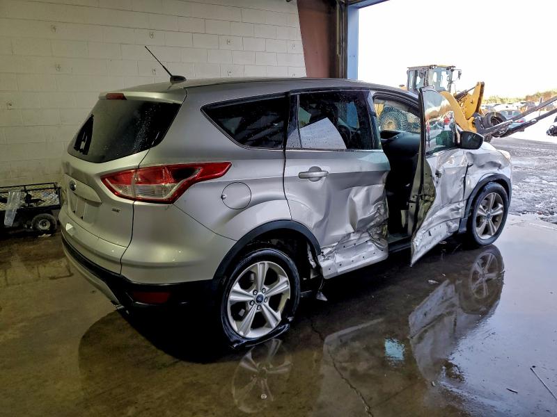 Photo 3 from auction – 2016 FORD ESCAPE SE with VIN 1FMCU0G77GUC21517