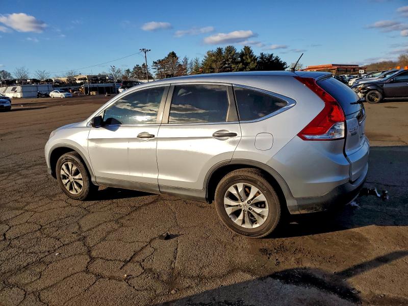 Photo 2 from auction – 2014 HONDA CR-V LX with VIN 2HKRM4H33EH671707