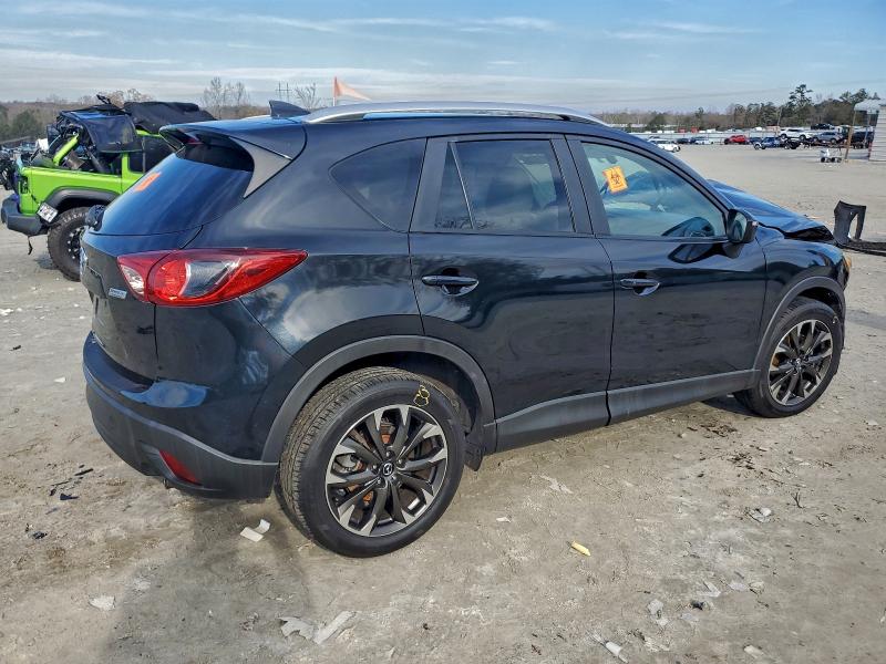 Photo 3 from auction – 2016 MAZDA CX-5 with VIN JM3KE2DY4G0677205