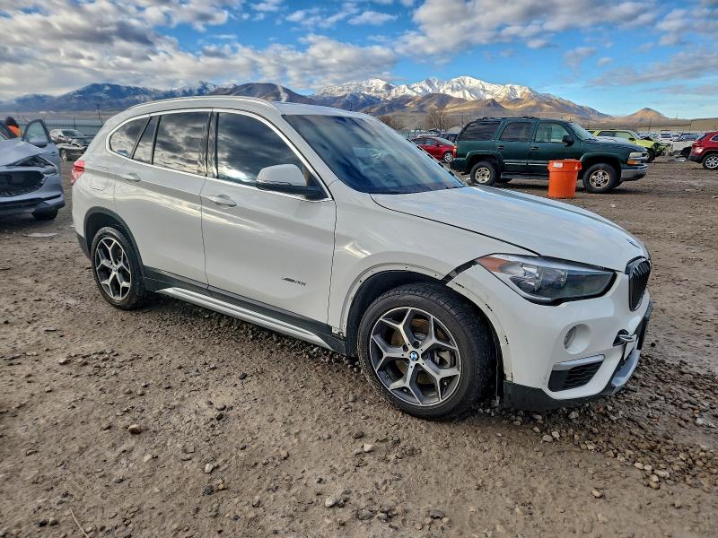 Photo 4 from auction – 2018 BMW X1 XDRIVE2 with VIN WBXHT3C31J5K24306