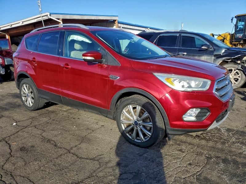Photo 4 from auction – 2017 FORD ESCAPE TIT with VIN 1FMCU9J95HUA23101