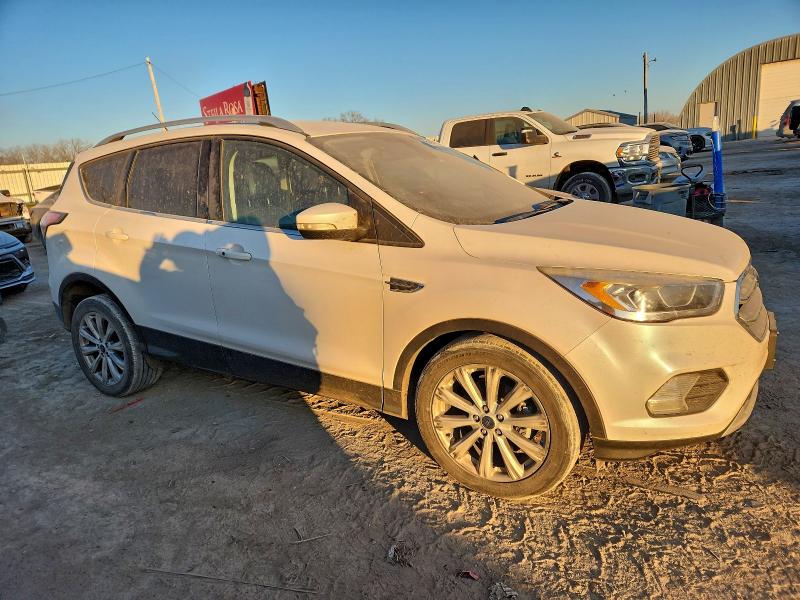 Photo 4 from auction – 2017 FORD ESCAPE with VIN 1FMCU0JD1HUE54387