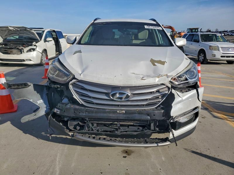 Photo 5 from auction – 2017 HYUNDAI SANTA FE S with VIN 5NMZU3LB9HH006336