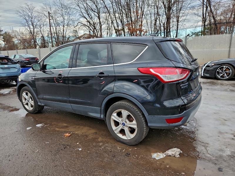 Photo 2 from auction – 2016 FORD ESCAPE SE with VIN 1FMCU9GX9GUC03833
