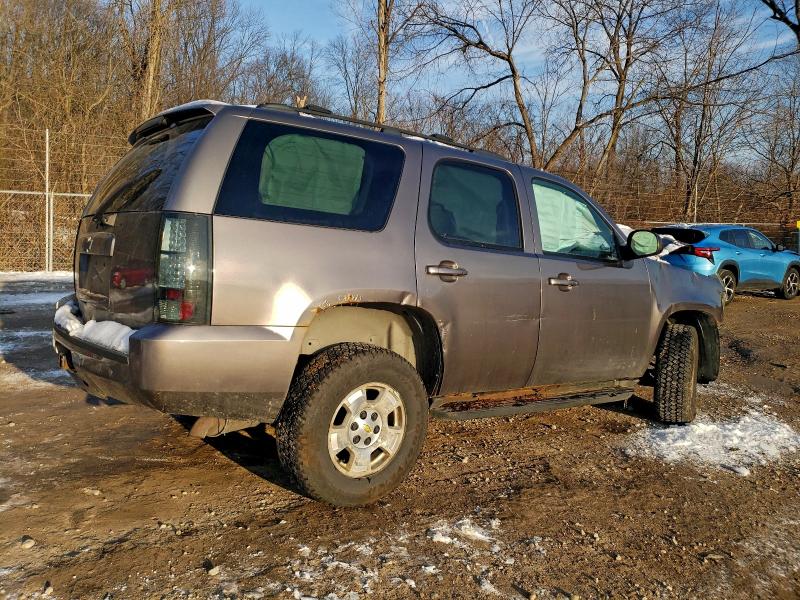 Photo 3 from auction – 2011 CHEVROLET TAHOE K150 with VIN 1GNSKBE07BR304178