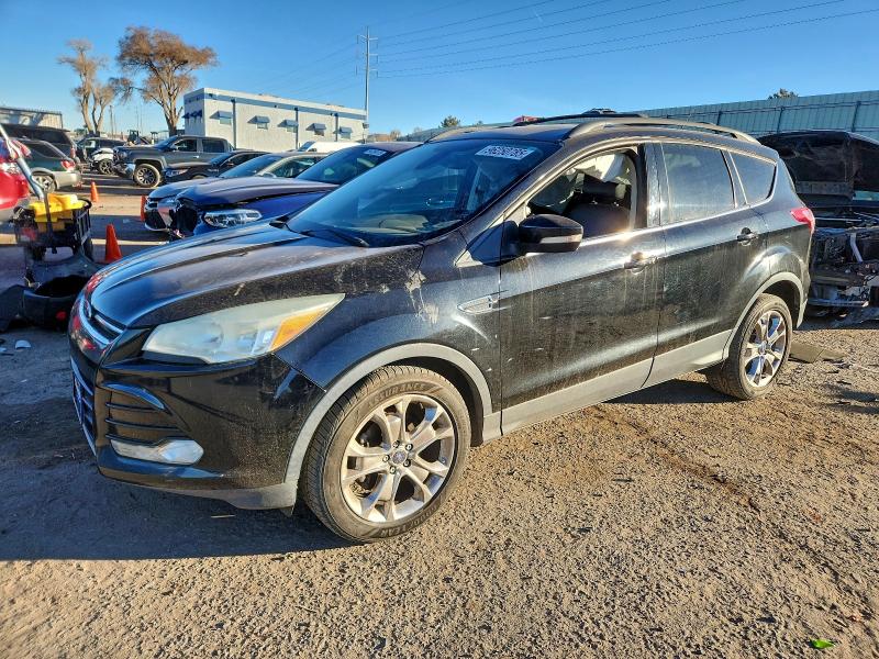 FORD ESCAPE 2013 with VIN 1FMCU0HX6DUD85173 - Photo from auction