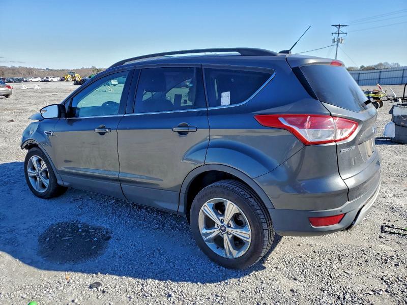 Photo 2 from auction – 2016 FORD ESCAPE SE with VIN 1FMCU9GX2GUC82536