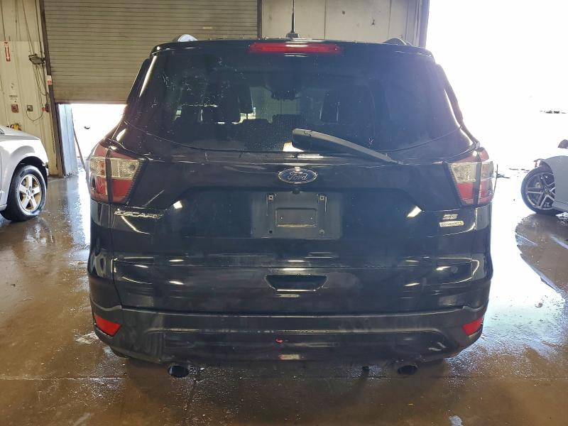 Photo 6 from auction – 2017 FORD ESCAPE SE with VIN 1FMCU0GD3HUD84060