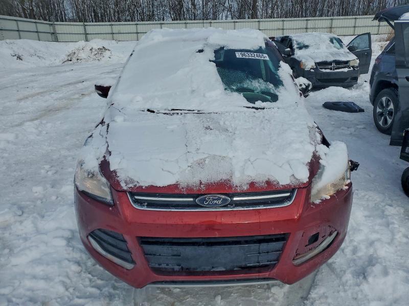 Photo 5 from auction – 2016 FORD ESCAPE TIT with VIN 1FMCU0J98GUA37732