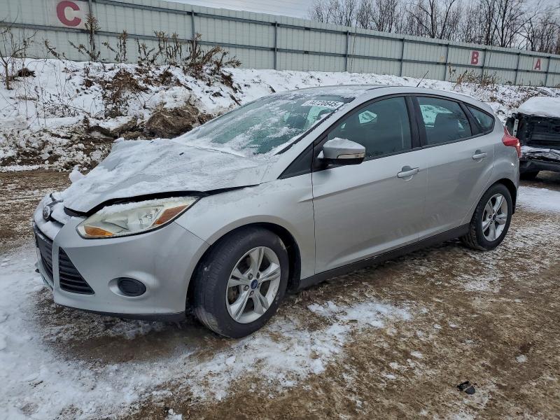 FORD FOCUS 2014 with VIN 1FADP3K2XEL357355 - Photo from auction