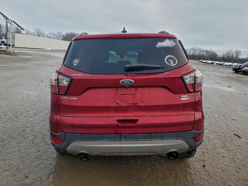 Photo 6 from auction – 2018 FORD ESCAPE with VIN 1FMCU9HD4JUD27312